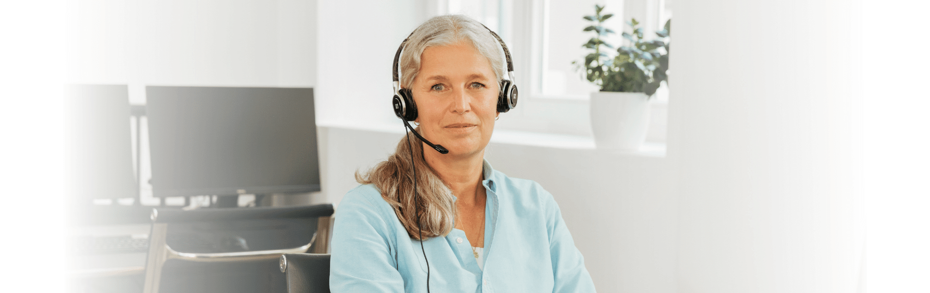 Kundenbetreuerin von Bunz mobile Physio mit Headset